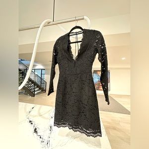 Black deep V plunge neck line dress in black NWT